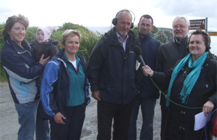 Moville residents being interviewed for the Pat Kenny radio show at Lafftery's Lane, Moville. The Campaign for a Clean Estuary group were there to oppose the building of the Moville-Greencastle sewerage treatment works at Carnagarve. Pictured from left, Clodagh Warnock with her 10 month old daughter Oonagh, Eithne Doogan, Enda Craig, Thomas Farren, Ronnie Parks and RTE's Valerie Cox.