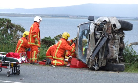 Members of Moville Fire Station work at the scene of Sunday's accident at Carnagarve.