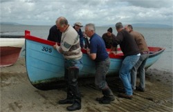 Foyle drift netters hauling their boats ashore back in 2007. Photo courtesy BBC.
