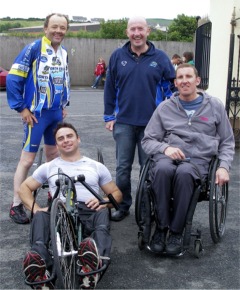 Back row, from left, Marty Noone of North Pole Cycling Club and Myles Sweeney of Donegal Sports Partnership pictured with handcyclists Karol Doherty, left, and Darrell Erwin of the Ulster Handcycling Association.