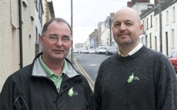 Sinn Fin members Cllr Daren Lalor and Colm Mac Lochlainn pictured wearing their Easter Lillies.