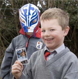 Buncrana brothers Eoin and Adam McGlinchey with the rare wrestling card.