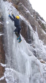 Martin McGuigan scales a frozen waterfall in the Poisoned Glen.