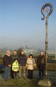 Pictured at the 'Shepherd's Crook' bronze sculpture at Trinity Court, Newtown, are from left, Sammy Holmes, committee member; John Deehan and son Liam who delivered the sculpture; George Gill, Jnr, on behalf of the main contractors George Gill & Sons; Trinity Court manager, Teresa McGee and sculptor Maurice Harron who designed and produced the piece.