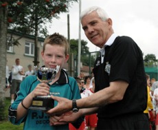 Inishowen captain Danny McMonagle pictured with the trophy.