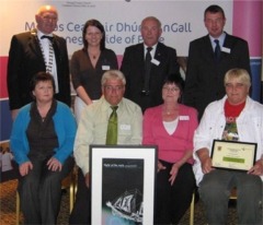 Standing from left to right are  Cllr John Boyle, outgoing Mayor of Donegal, Breid Neely, Community Development Officer, Donegal County Council, John Henry McLaughlin, Chairperson of Donegal County Community Forum and Cllr Francis Conaghan, Chairperson of Donegal County Development Board. Seated are Mary McCallion, Inishowen Development Partnership, Joseph McLaughlin, Una ODonnell, Josie Diver of the Ard Kilbride Residents' Association.