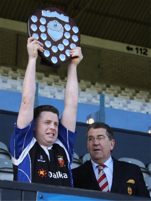 Inishowen captain James McColgan lifts the Butler Shield.