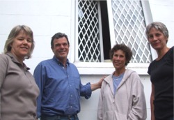 Michael Dowling with visiting artists, from left, painter Jill Sadler and sculptors, Mary Begin and Denise Driscoll.